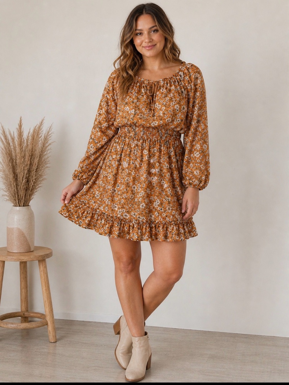 This is a Ryan Michelle floral peasant mini dress in size M.